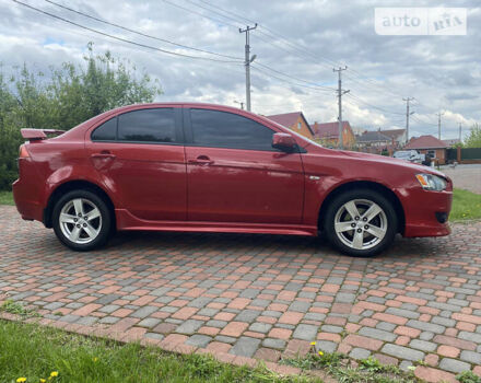 Червоний Міцубісі Lancer, об'ємом двигуна 2 л та пробігом 191 тис. км за 7500 $, фото 4 на Automoto.ua