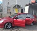 Красный Мицубиси Лансер, объемом двигателя 2 л и пробегом 200 тыс. км за 5300 $, фото 1 на Automoto.ua