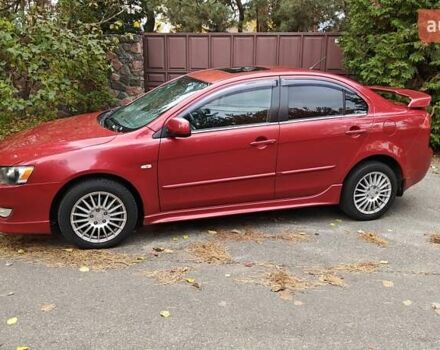 Красный Мицубиси Лансер, объемом двигателя 2 л и пробегом 186 тыс. км за 5600 $, фото 9 на Automoto.ua