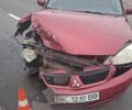 Красный Мицубиси Лансер, объемом двигателя 1.6 л и пробегом 270 тыс. км за 1564 $, фото 1 на Automoto.ua