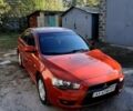 Красный Мицубиси Лансер, объемом двигателя 2 л и пробегом 110 тыс. км за 7500 $, фото 2 на Automoto.ua