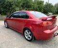 Червоний Міцубісі Lancer, об'ємом двигуна 2 л та пробігом 259 тис. км за 6500 $, фото 3 на Automoto.ua