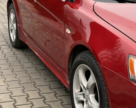 Красный Мицубиси Лансер, объемом двигателя 2 л и пробегом 261 тыс. км за 7200 $, фото 3 на Automoto.ua