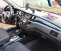 Красный Мицубиси Лансер, объемом двигателя 1.6 л и пробегом 214 тыс. км за 5000 $, фото 6 на Automoto.ua