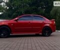 Червоний Міцубісі Lancer, об'ємом двигуна 2 л та пробігом 101 тис. км за 6999 $, фото 6 на Automoto.ua