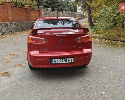 Червоний Міцубісі Lancer, об'ємом двигуна 2 л та пробігом 187 тис. км за 5500 $, фото 10 на Automoto.ua