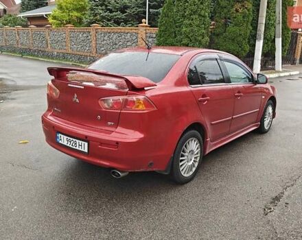 Червоний Міцубісі Lancer, об'ємом двигуна 2 л та пробігом 186 тис. км за 5600 $, фото 8 на Automoto.ua