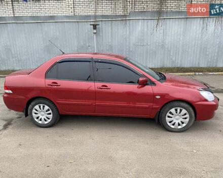 Червоний Міцубісі Lancer, об'ємом двигуна 1.58 л та пробігом 151 тис. км за 5600 $, фото 8 на Automoto.ua
