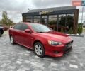 Червоний Міцубісі Lancer, об'ємом двигуна 2 л та пробігом 293 тис. км за 6399 $, фото 1 на Automoto.ua