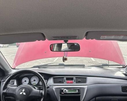 Красный Мицубиси Лансер, объемом двигателя 1.6 л и пробегом 176 тыс. км за 4300 $, фото 10 на Automoto.ua