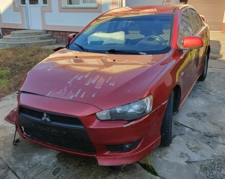 Красный Мицубиси Лансер, объемом двигателя 2 л и пробегом 406 тыс. км за 2750 $, фото 1 на Automoto.ua