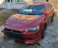 Красный Мицубиси Лансер, объемом двигателя 2 л и пробегом 406 тыс. км за 2750 $, фото 1 на Automoto.ua