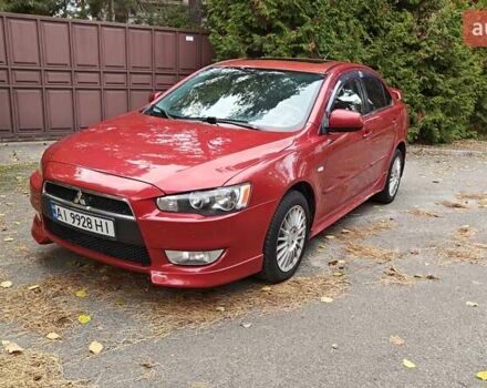 Червоний Міцубісі Lancer, об'ємом двигуна 2 л та пробігом 187 тис. км за 5500 $, фото 1 на Automoto.ua
