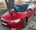 Червоний Міцубісі Lancer, об'ємом двигуна 2 л та пробігом 298 тис. км за 6000 $, фото 1 на Automoto.ua