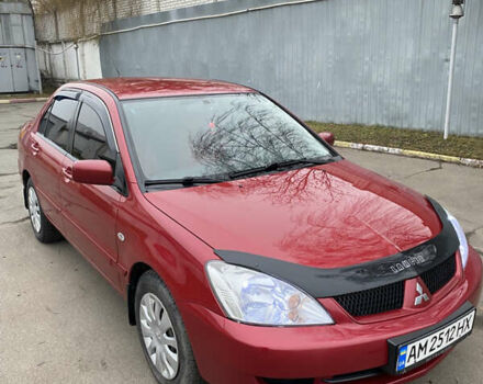 Червоний Міцубісі Lancer, об'ємом двигуна 1.58 л та пробігом 151 тис. км за 5600 $, фото 10 на Automoto.ua