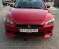 Червоний Міцубісі Lancer, об'ємом двигуна 2 л та пробігом 240 тис. км за 5700 $, фото 1 на Automoto.ua
