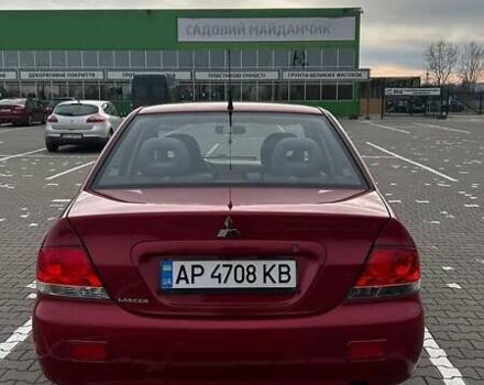 Красный Мицубиси Лансер, объемом двигателя 1.6 л и пробегом 176 тыс. км за 4300 $, фото 2 на Automoto.ua