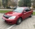Червоний Міцубісі Lancer, об'ємом двигуна 1.6 л та пробігом 286 тис. км за 4998 $, фото 1 на Automoto.ua