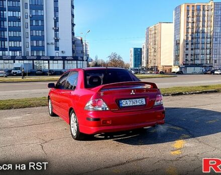 Червоний Міцубісі Lancer, об'ємом двигуна 2 л та пробігом 164 тис. км за 4900 $, фото 2 на Automoto.ua