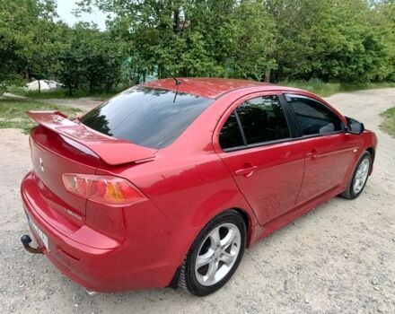 Червоний Міцубісі Lancer, об'ємом двигуна 2 л та пробігом 259 тис. км за 6500 $, фото 4 на Automoto.ua