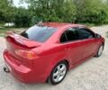 Червоний Міцубісі Lancer, об'ємом двигуна 2 л та пробігом 259 тис. км за 6500 $, фото 4 на Automoto.ua