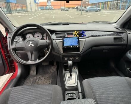 Красный Мицубиси Лансер, объемом двигателя 1.6 л и пробегом 285 тыс. км за 3650 $, фото 10 на Automoto.ua