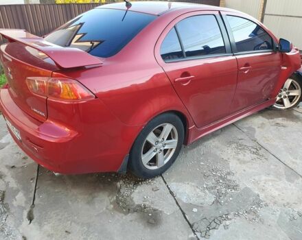 Красный Мицубиси Лансер, объемом двигателя 2 л и пробегом 406 тыс. км за 2750 $, фото 4 на Automoto.ua