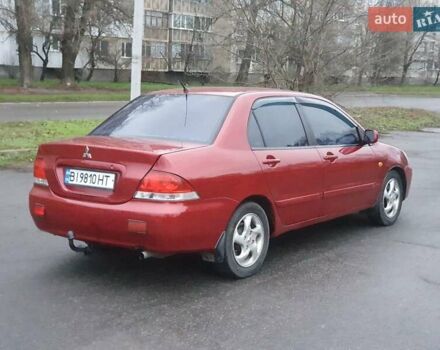 Красный Мицубиси Лансер, объемом двигателя 1.6 л и пробегом 250 тыс. км за 3700 $, фото 4 на Automoto.ua