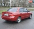 Красный Мицубиси Лансер, объемом двигателя 1.6 л и пробегом 250 тыс. км за 3700 $, фото 4 на Automoto.ua
