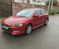 Червоний Міцубісі Lancer, об'ємом двигуна 2 л та пробігом 186 тис. км за 5600 $, фото 2 на Automoto.ua