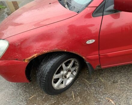 Червоний Міцубісі Lancer, об'ємом двигуна 1.6 л та пробігом 300 тис. км за 2799 $, фото 7 на Automoto.ua