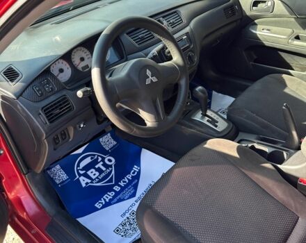 Червоний Міцубісі Lancer, об'ємом двигуна 1.6 л та пробігом 230 тис. км за 5300 $, фото 15 на Automoto.ua