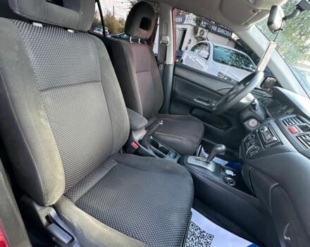 Красный Мицубиси Лансер, объемом двигателя 1.6 л и пробегом 230 тыс. км за 5300 $, фото 9 на Automoto.ua