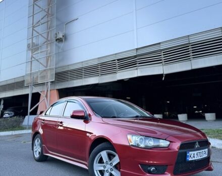 Красный Мицубиси Лансер, объемом двигателя 2 л и пробегом 307 тыс. км за 6499 $, фото 1 на Automoto.ua