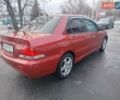 Червоний Міцубісі Lancer, об'ємом двигуна 1.6 л та пробігом 330 тис. км за 4350 $, фото 6 на Automoto.ua