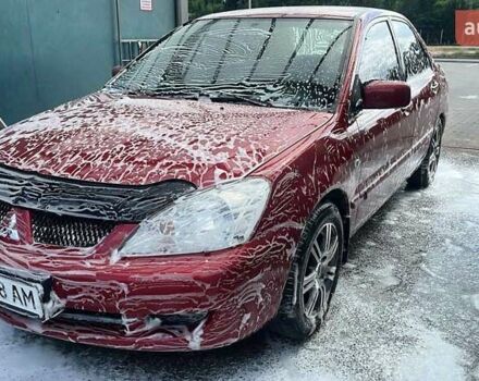 Красный Мицубиси Лансер, объемом двигателя 0 л и пробегом 282 тыс. км за 5200 $, фото 9 на Automoto.ua