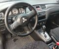 Червоний Міцубісі Lancer, об'ємом двигуна 1.6 л та пробігом 330 тис. км за 4350 $, фото 19 на Automoto.ua