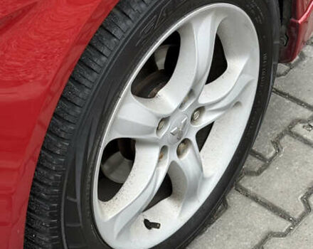 Красный Мицубиси Лансер, объемом двигателя 2 л и пробегом 261 тыс. км за 7200 $, фото 18 на Automoto.ua