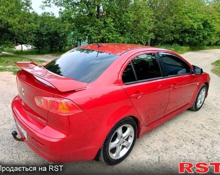 Червоний Міцубісі Lancer, об'ємом двигуна 2 л та пробігом 259 тис. км за 6500 $, фото 1 на Automoto.ua