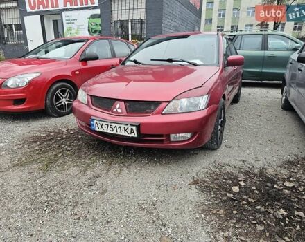 Червоний Міцубісі Lancer, об'ємом двигуна 1.6 л та пробігом 267 тис. км за 2999 $, фото 2 на Automoto.ua