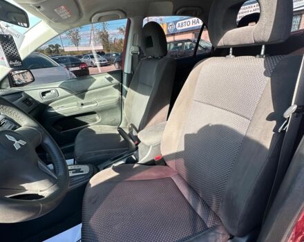 Красный Мицубиси Лансер, объемом двигателя 1.6 л и пробегом 230 тыс. км за 5300 $, фото 17 на Automoto.ua