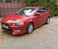 Міцубісі Lancer 2007 у Києві на Automoto.ua Червоний Міцубісі Lancer, об'ємом двигуна 2 л та пробігом 186 тис. км за 5600 $, фото 5 на Automoto.ua