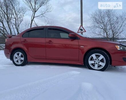 Червоний Міцубісі Lancer, об'ємом двигуна 2 л та пробігом 171 тис. км за 7500 $, фото 20 на Automoto.ua