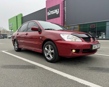 Красный Мицубиси Лансер, объемом двигателя 1.6 л и пробегом 285 тыс. км за 3650 $, фото 1 на Automoto.ua