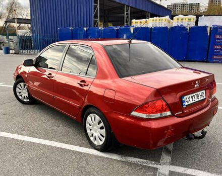 Червоний Міцубісі Lancer, об'ємом двигуна 1.6 л та пробігом 194 тис. км за 5500 $, фото 4 на Automoto.ua