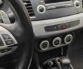 Червоний Міцубісі Lancer, об'ємом двигуна 2 л та пробігом 186 тис. км за 5600 $, фото 15 на Automoto.ua