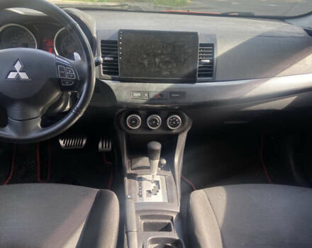 Червоний Міцубісі Lancer, об'ємом двигуна 2 л та пробігом 251 тис. км за 5900 $, фото 13 на Automoto.ua