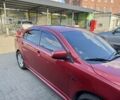 Красный Мицубиси Лансер, объемом двигателя 2 л и пробегом 267 тыс. км за 7000 $, фото 10 на Automoto.ua
