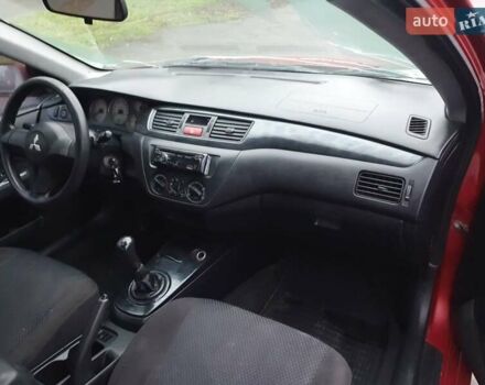 Красный Мицубиси Лансер, объемом двигателя 1.6 л и пробегом 250 тыс. км за 3700 $, фото 8 на Automoto.ua