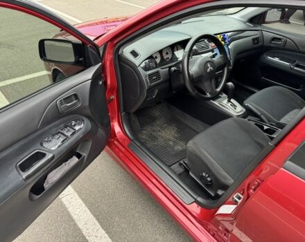 Красный Мицубиси Лансер, объемом двигателя 1.6 л и пробегом 285 тыс. км за 3650 $, фото 9 на Automoto.ua